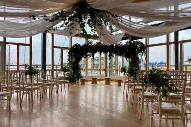 Open plan venue in EH Woolwich with elegant ceiling draping for intimate wedding ceremony events.