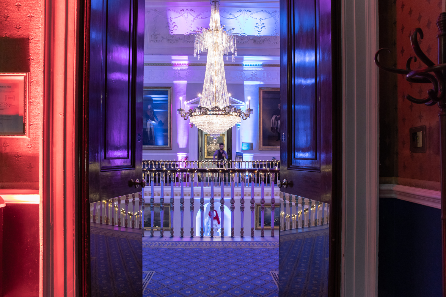 Elegant chandelier at 116 Pall Mall for upscale Christmas parties and events. - Banner