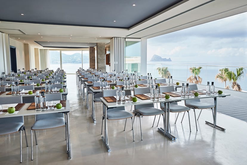 Modern meeting space at 7Pines Resort Ibiza with ocean view, ideal for conferences and workshops.