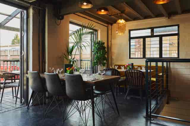 Industrial-chic Mezzanine at The Exhibit Balham, perfect for networking events and team workshops.