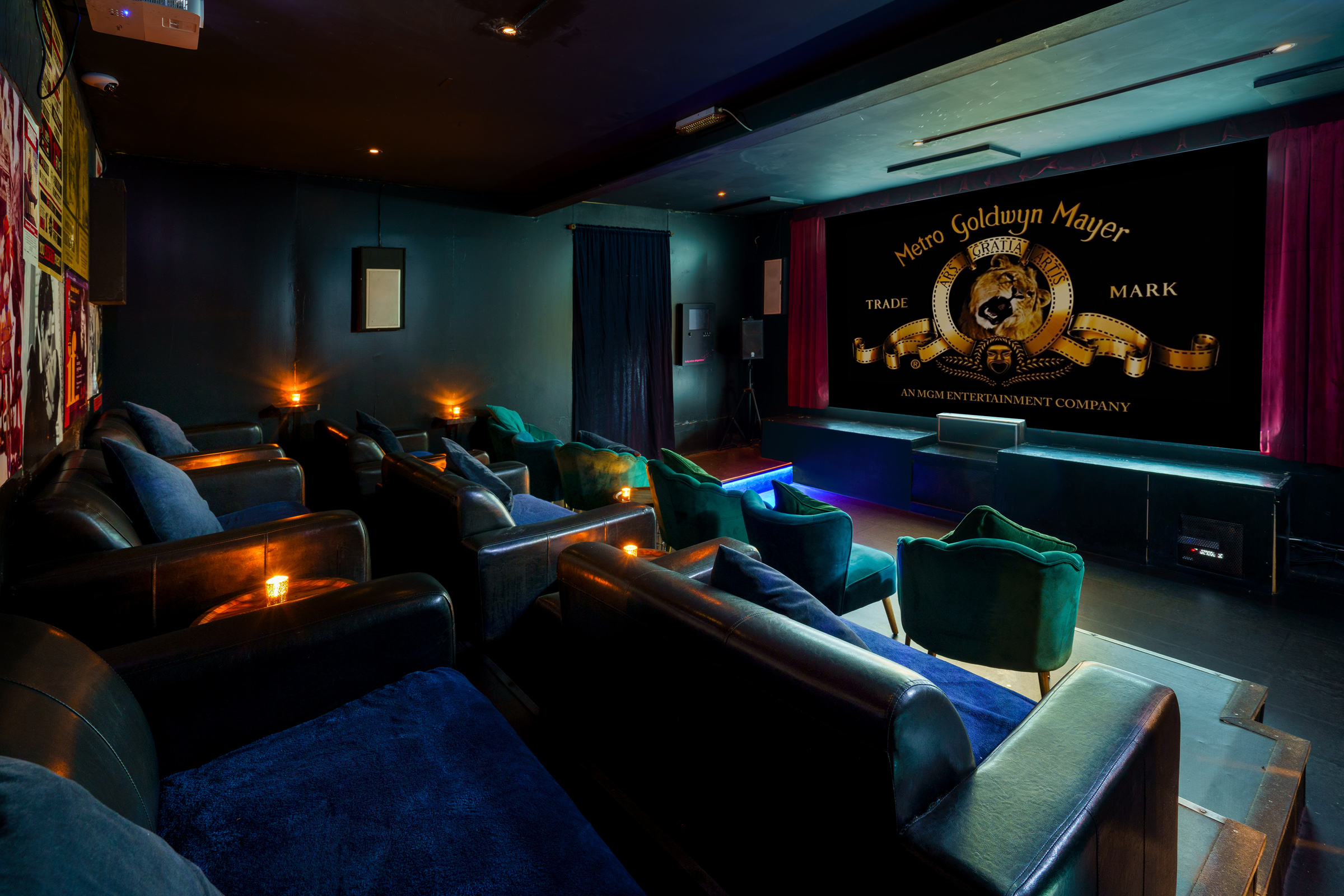 Stylish screening room at The Exhibit Balham for private events and corporate presentations. - Banner