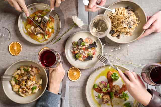 Elegant dining setup for corporate events at SW16 Bar and Kitchen, showcasing diverse dishes.