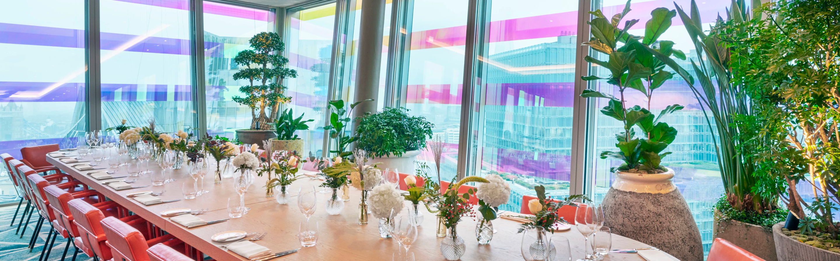 Private dining room with elegant table setting for corporate meetings and social gatherings. - Banner