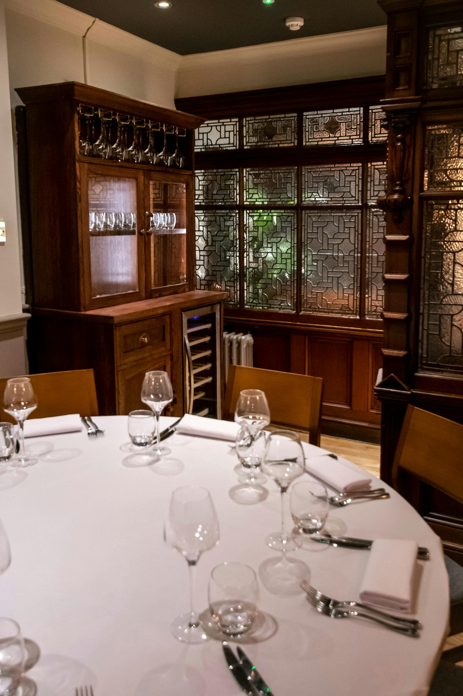 Elegant dining table in Clementine Room, Maddox Tavern for private events and meetings.