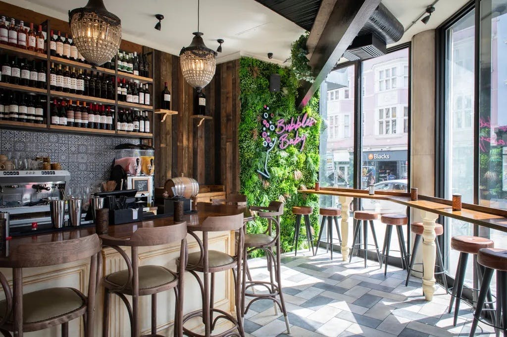 Tapas Revolution Brighton: modern bar, greenery, ideal for networking events and gatherings.