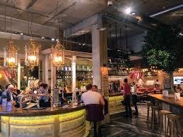 Tapas Revolution Bath: vibrant restaurant with warm lighting for networking events.