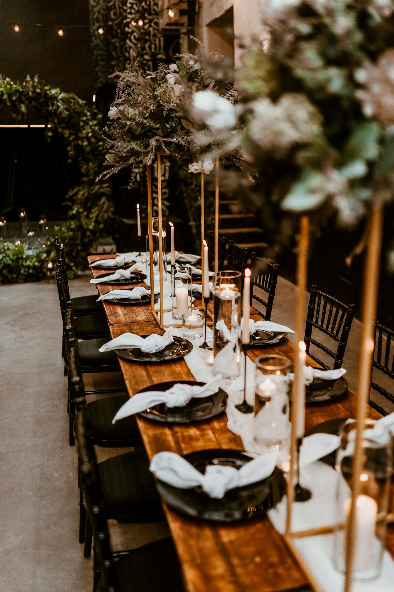Elegant dining table with candles in Box Hub for formal events and celebrations.