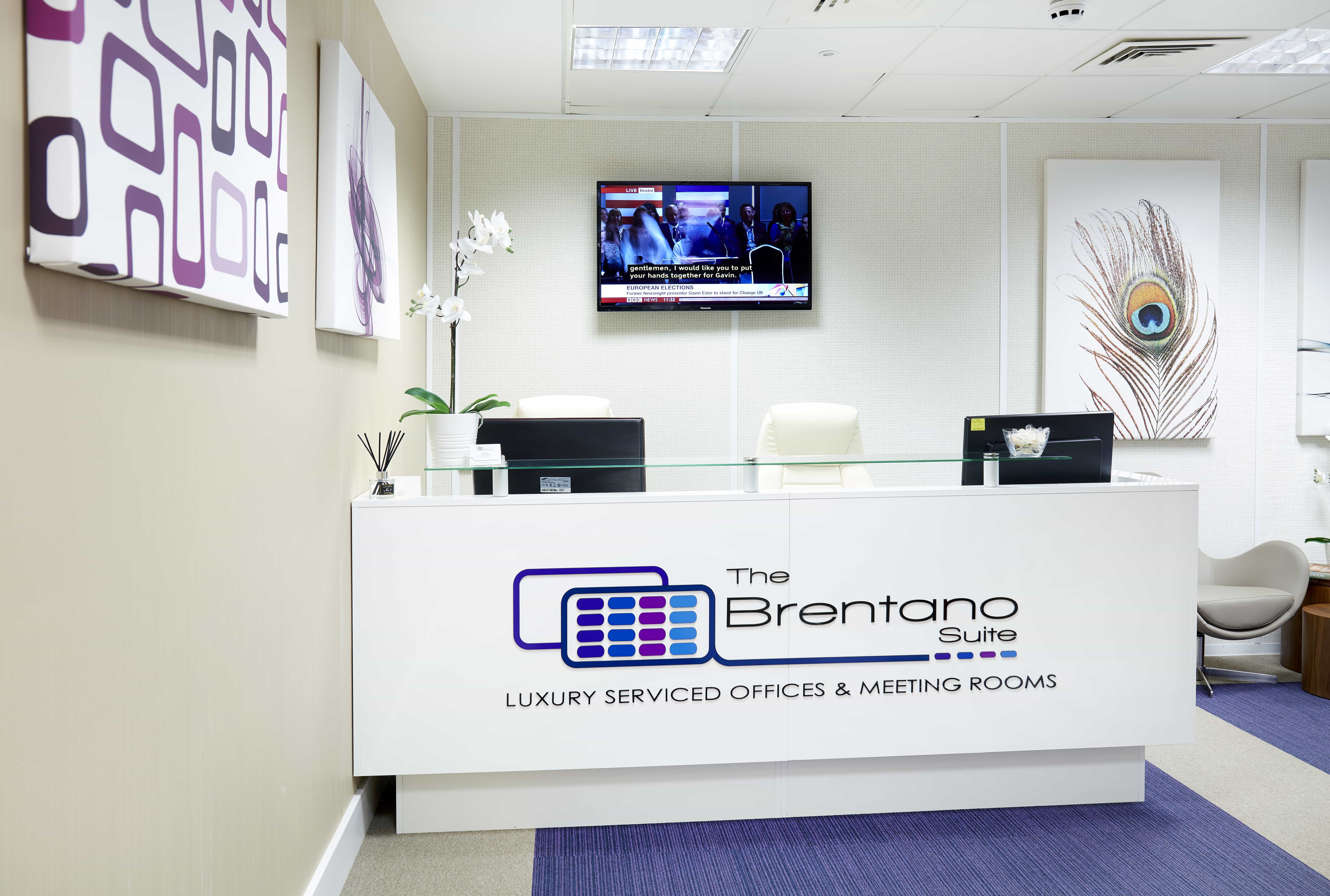 Chopin in modern reception area of The Brentano Suites for upscale meetings and events. - Banner