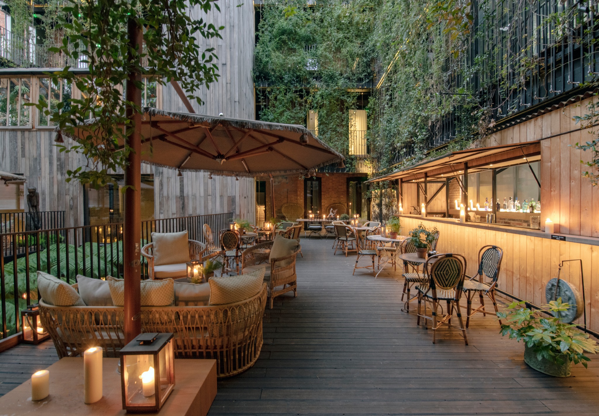 Mandrake Terrace outdoor venue with lush greenery for intimate gatherings and events. - Banner