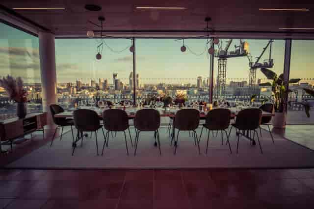 Private dining room with skyline views, ideal for corporate events and meetings.