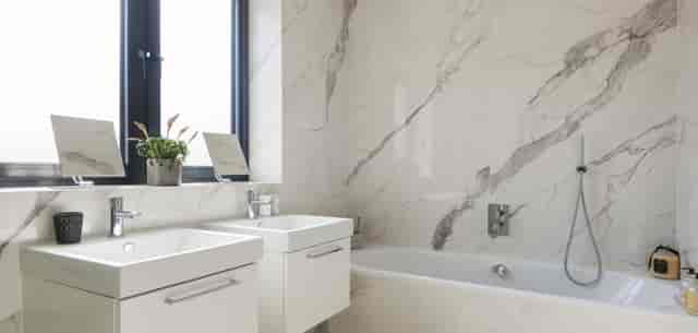 Luxury apartment bathroom at Charing Cross, modern design for upscale events.