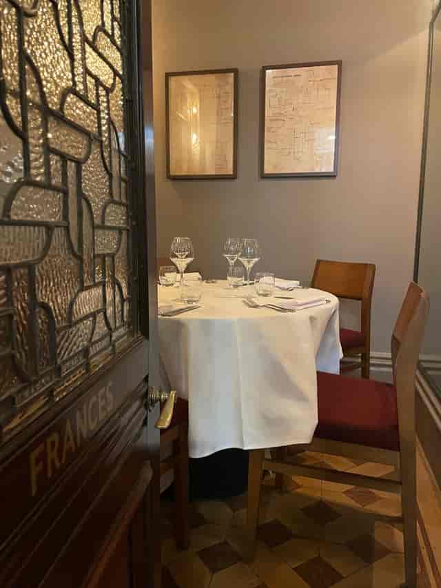 Intimate dining setup in Frances Room, Maddox Tavern for corporate events and gatherings.