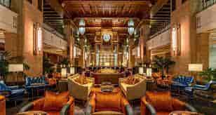 Luxurious hotel lobby with elegant seating, ideal for networking events and receptions.