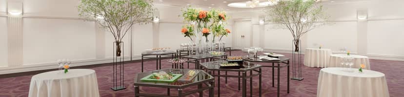 Elegant reception space with floral arrangements at Hyatt Place Montreal Downtown.