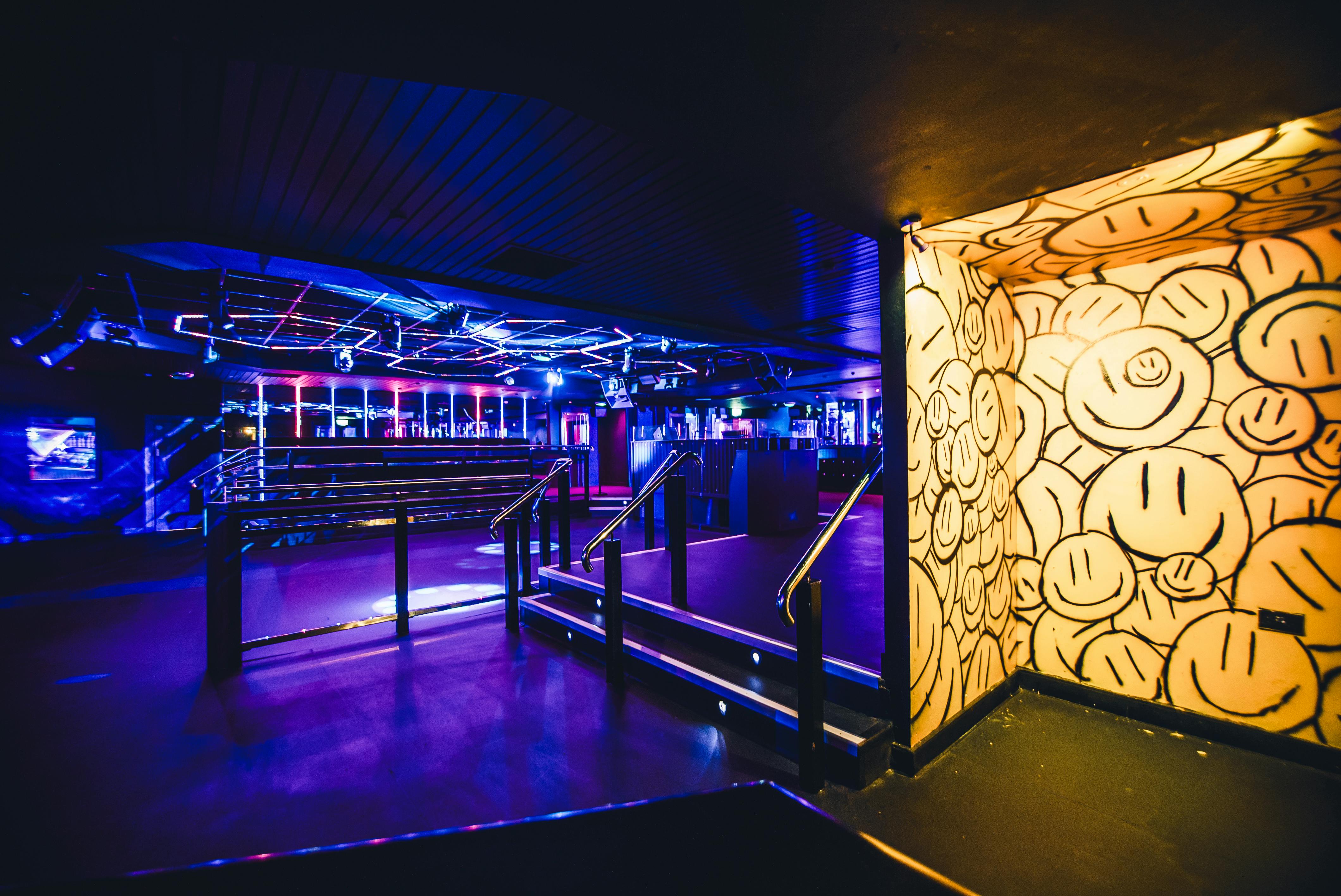 Vibrant event space in Circuit Cardiff with dynamic lighting for parties and networking.