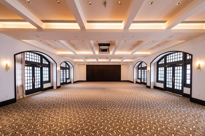 Casuarina Suite at Raffles Singapore, spacious event room with natural light for weddings and conferences.