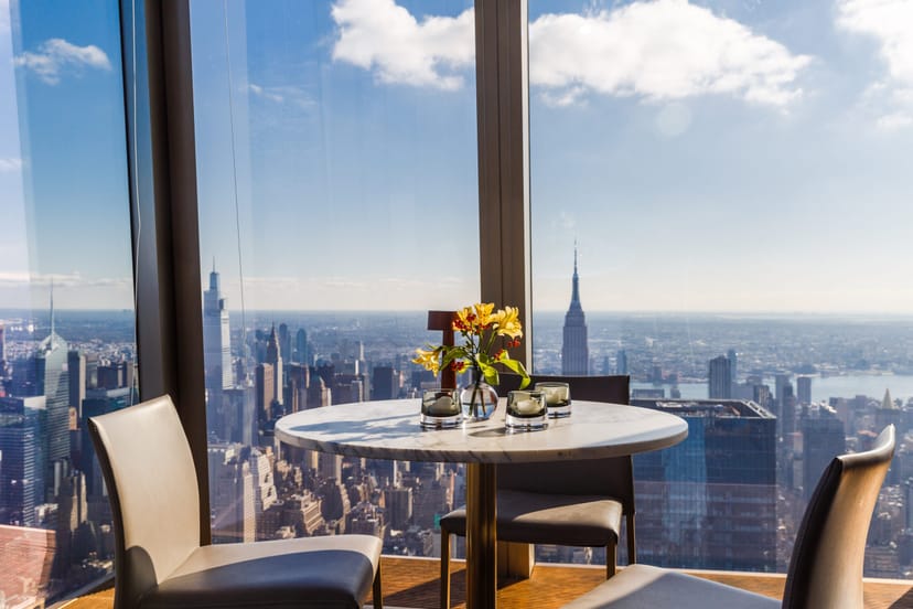 Elegant meeting space with NYC skyline view, perfect for corporate events and private dinners.