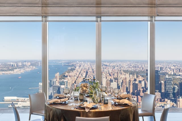 Sophisticated event space with city skyline view, ideal for corporate meetings and upscale celebrations.