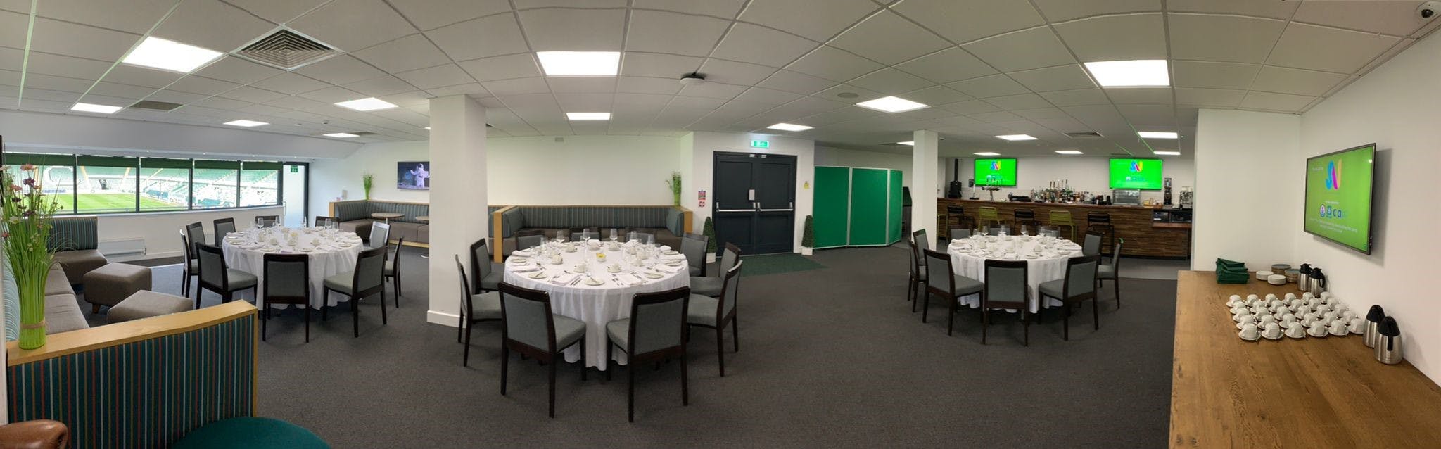 Players' Lounge at Home Park Stadium, elegant dining setup for networking events.