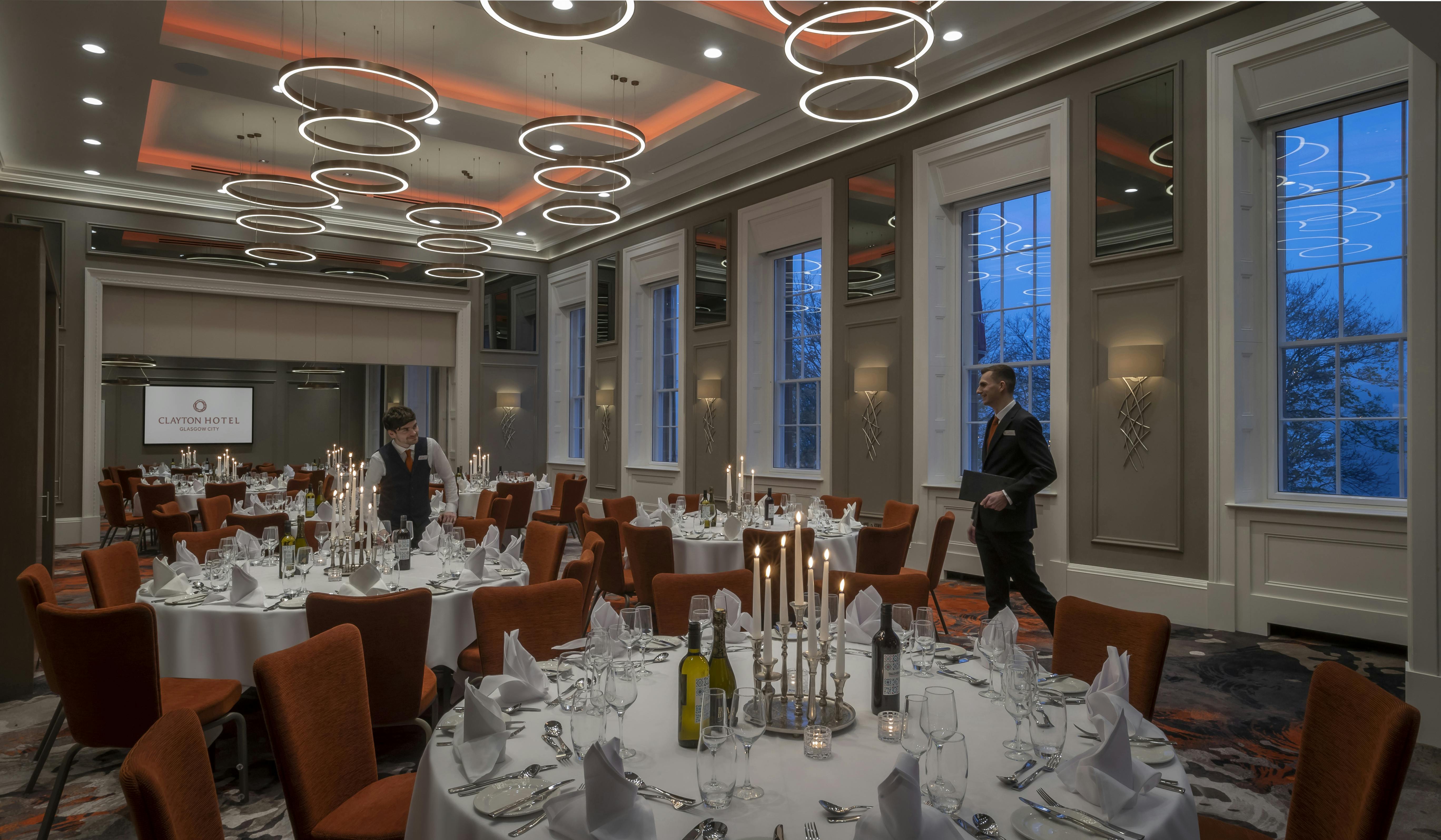 Elegant dinner setup at Custom House, Glasgow; ideal for corporate events and celebrations.