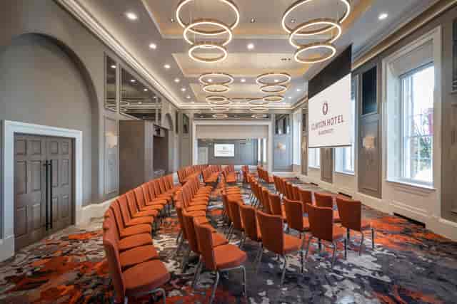 Custom House meeting space in Clayton Hotel Glasgow, featuring modern seating for conferences.