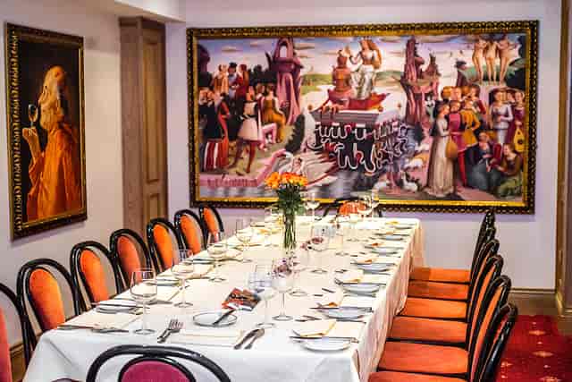 Elegant dining table in Venetian Room, Bolton's Restaurant for intimate gatherings and corporate events.
