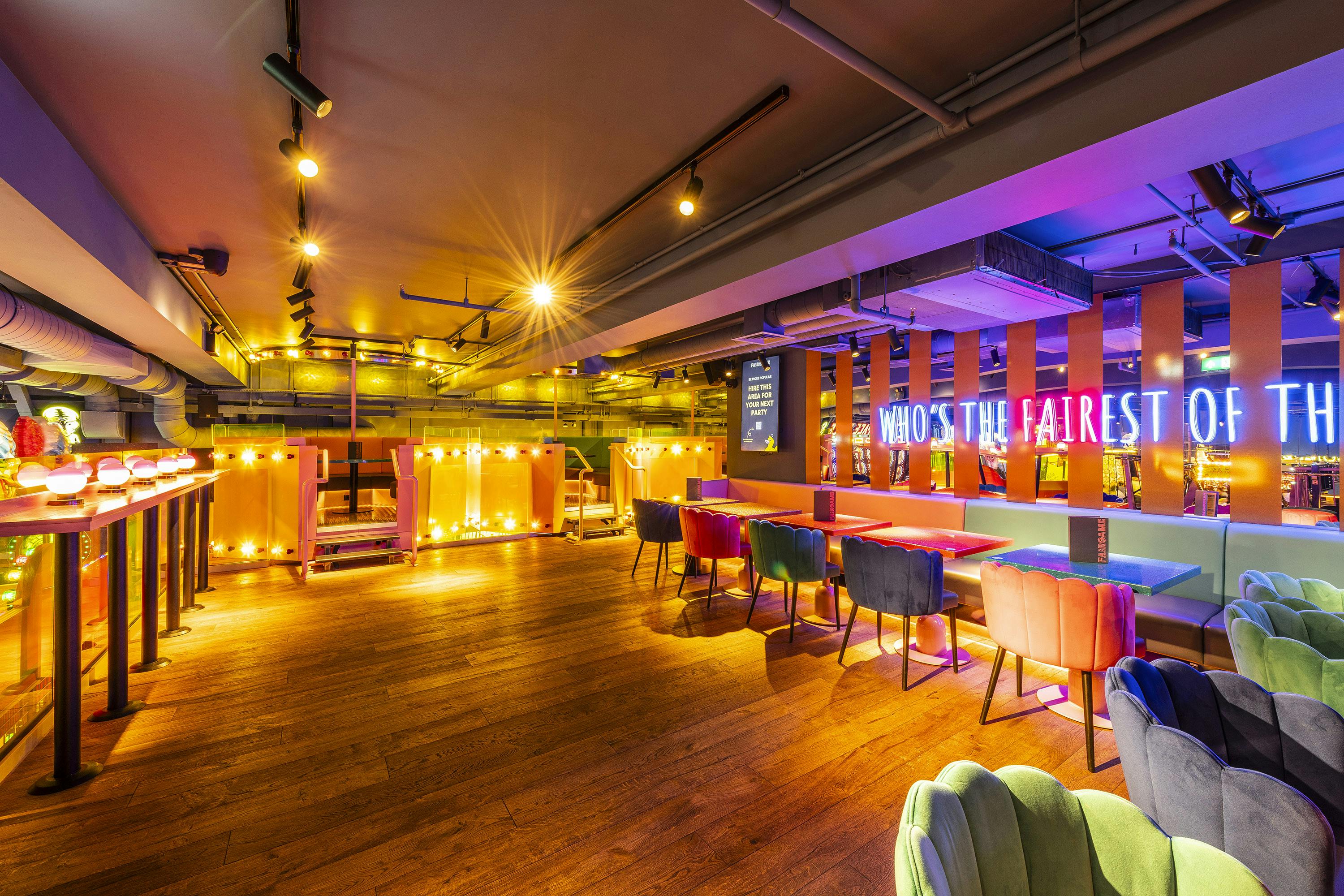 Big Top Mezzanine event space with colorful seating for social gatherings and celebrations.