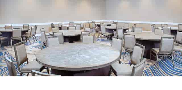 Versatile event space with round tables at Maverick AB, Hilton Boston Back Bay.