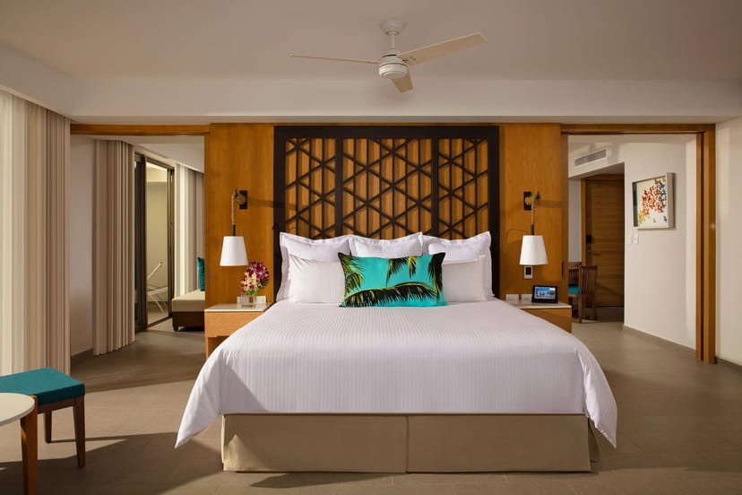 Spacious hotel room at Dreams Natura, perfect for events and relaxation.