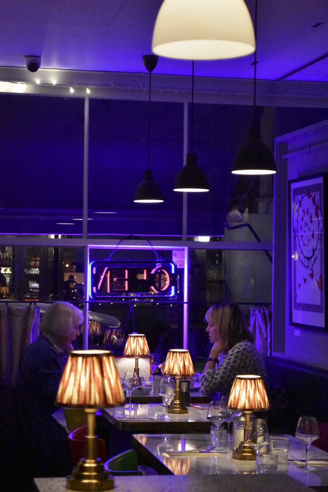 Cozy restaurant setting in Sam's Cafe, ideal for networking events and small gatherings.