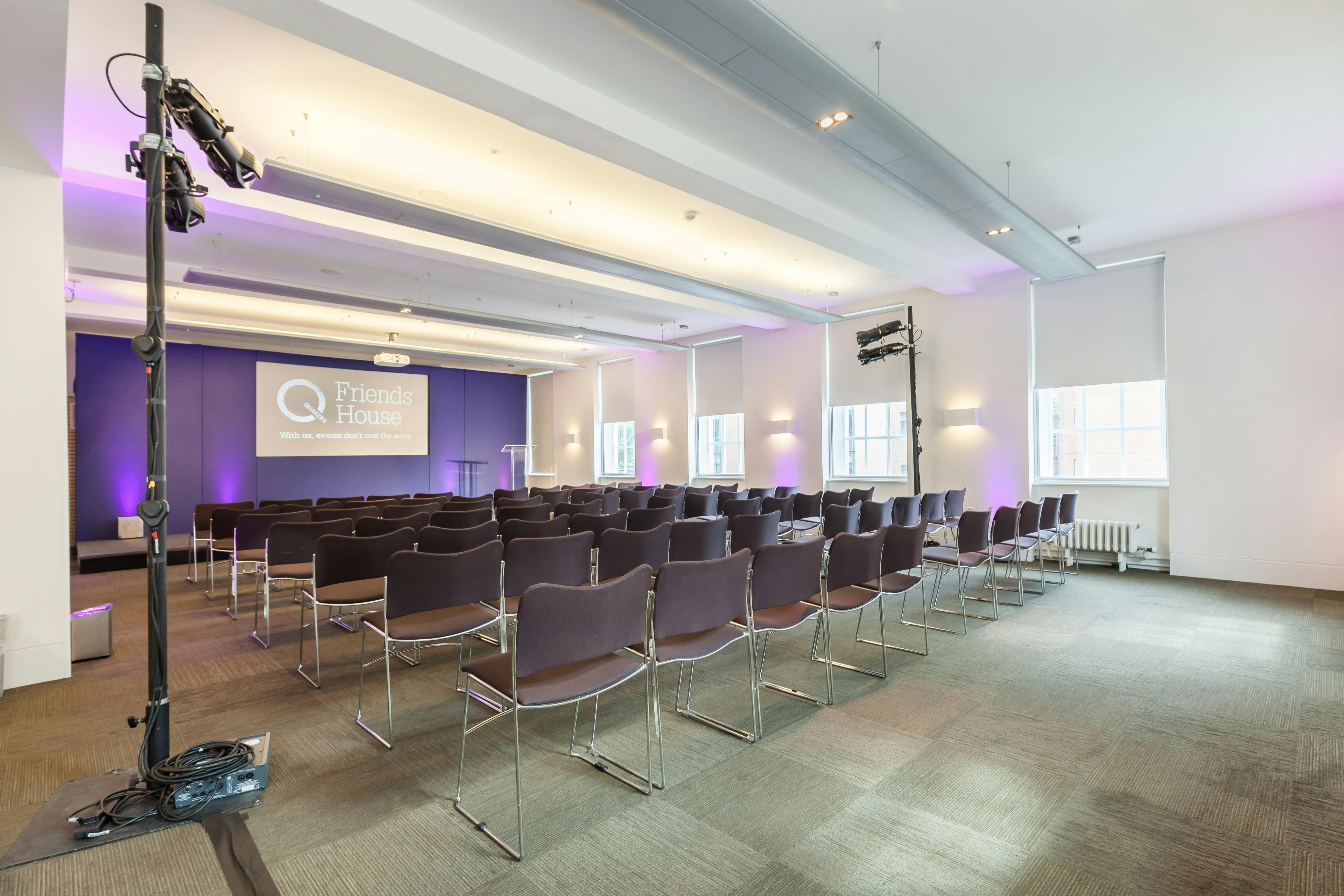 Event space at George Fox with elegant purple lighting, perfect for conferences.