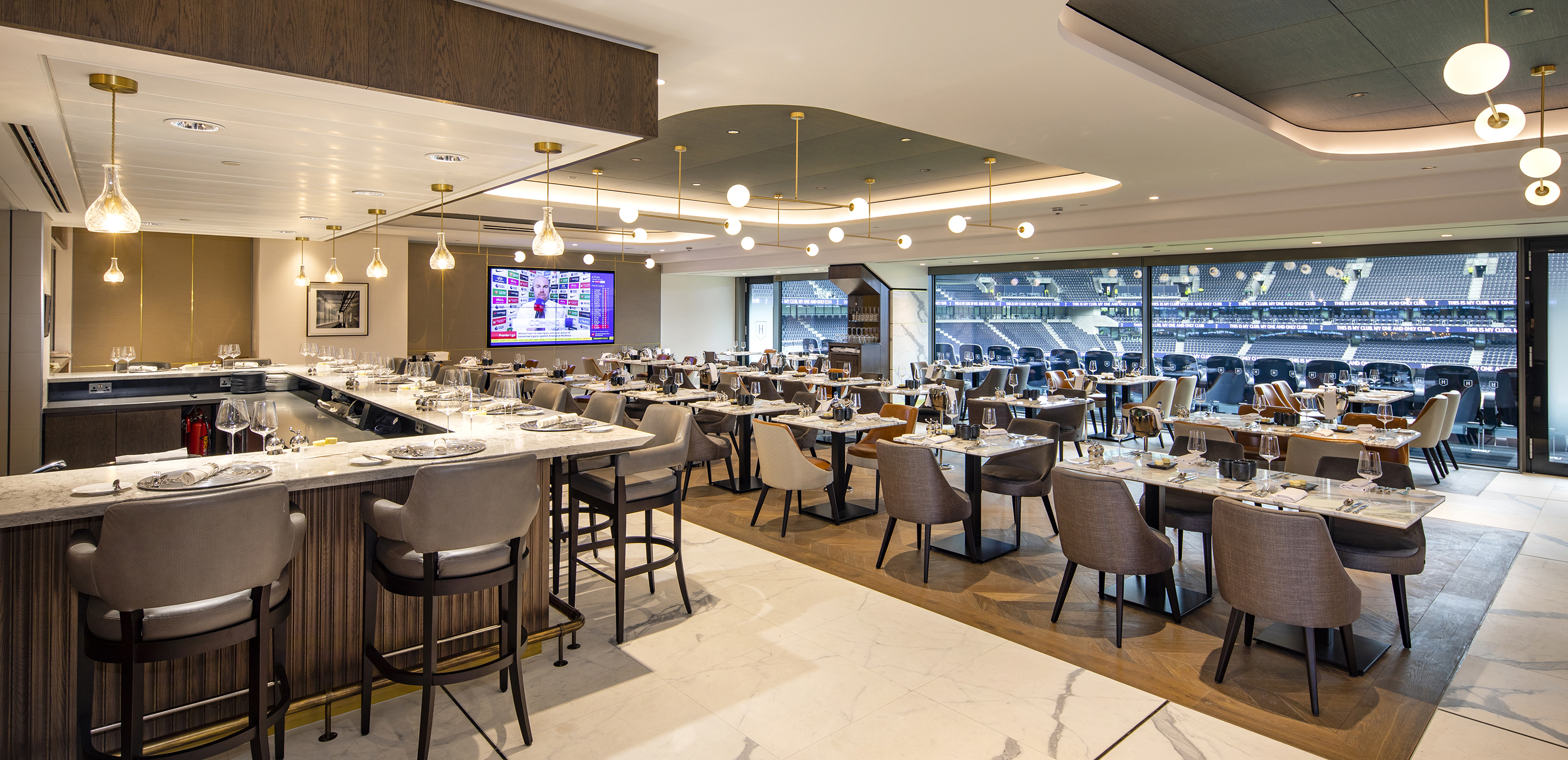 Elegant dining area in The H Club at Tottenham Hotspur Stadium, perfect for corporate events. - Banner