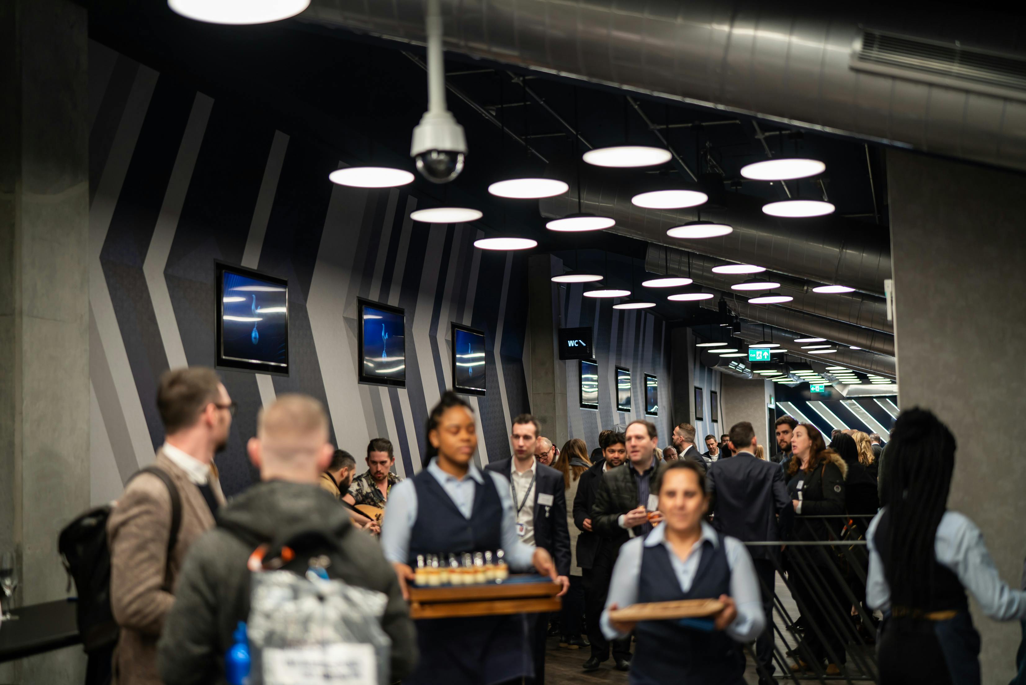 Lower East Side event space at Tottenham Hotspur Stadium, modern design, networking.