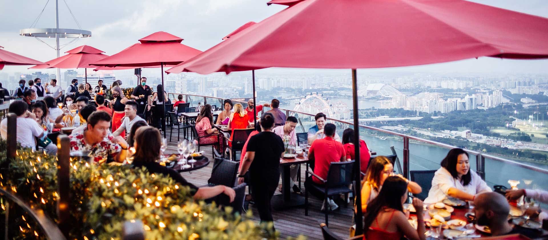 Vibrant rooftop Club Lounge at Ce La Vi with stylish seating for upscale events.