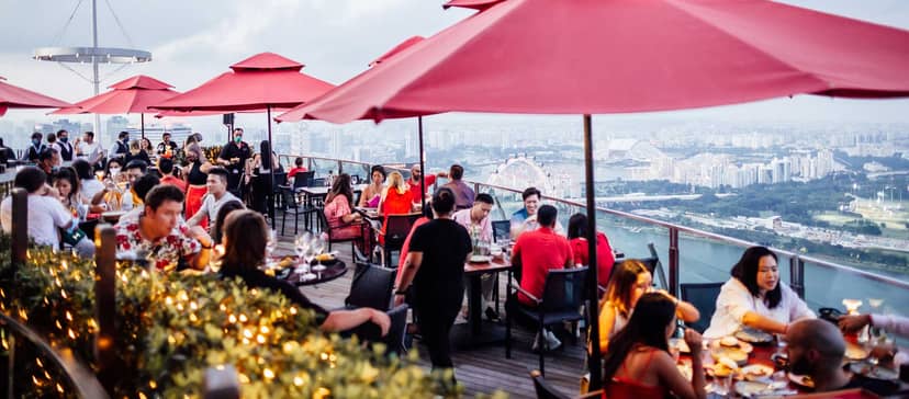 Vibrant rooftop Club Lounge at Ce La Vi with stylish seating for upscale events.
