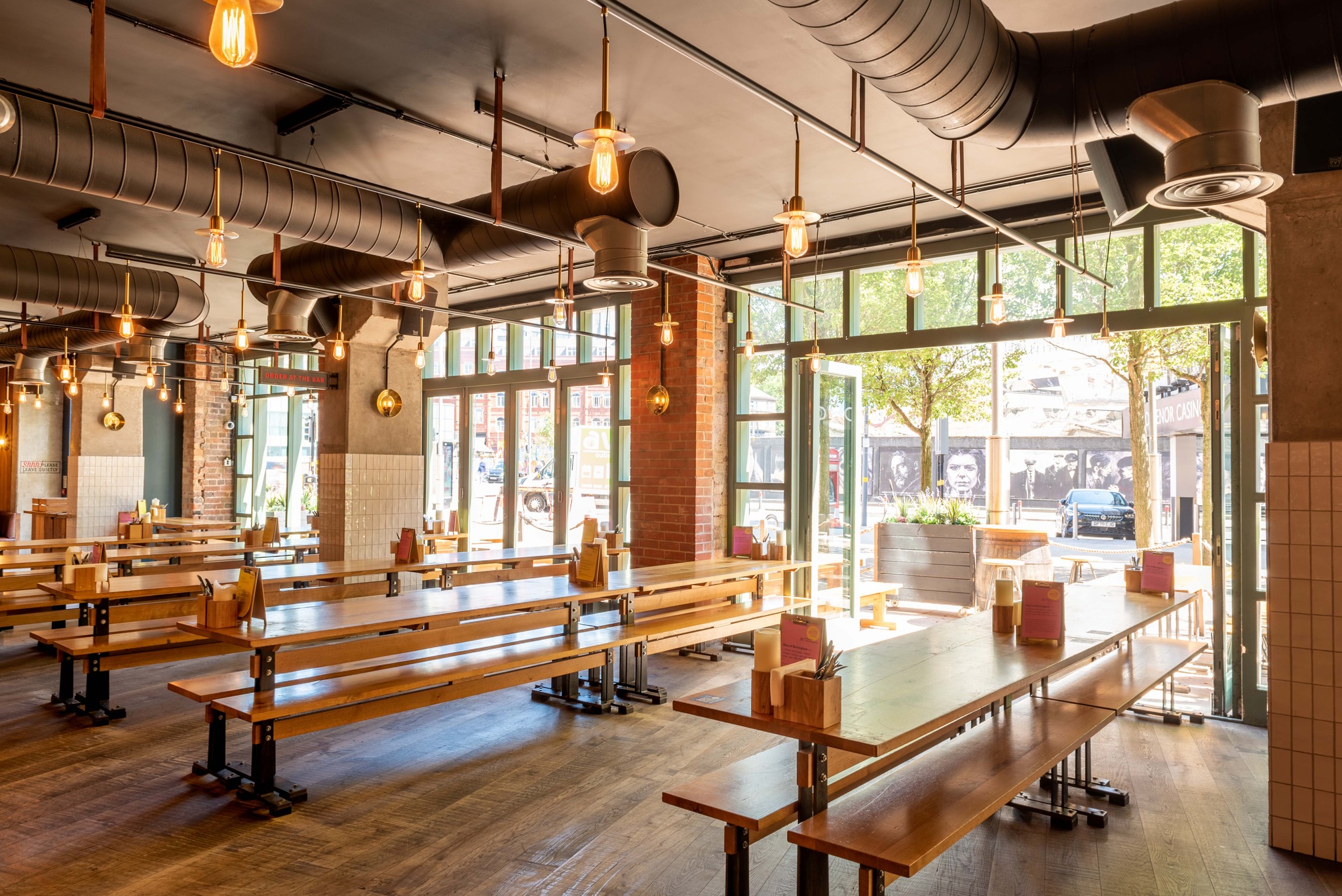 Spacious industrial venue with natural light for networking events in Birmingham.