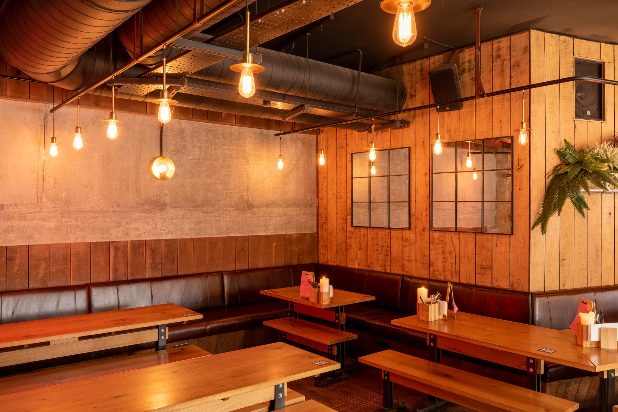 Cozy modern venue with wooden accents for networking events in Birmingham.