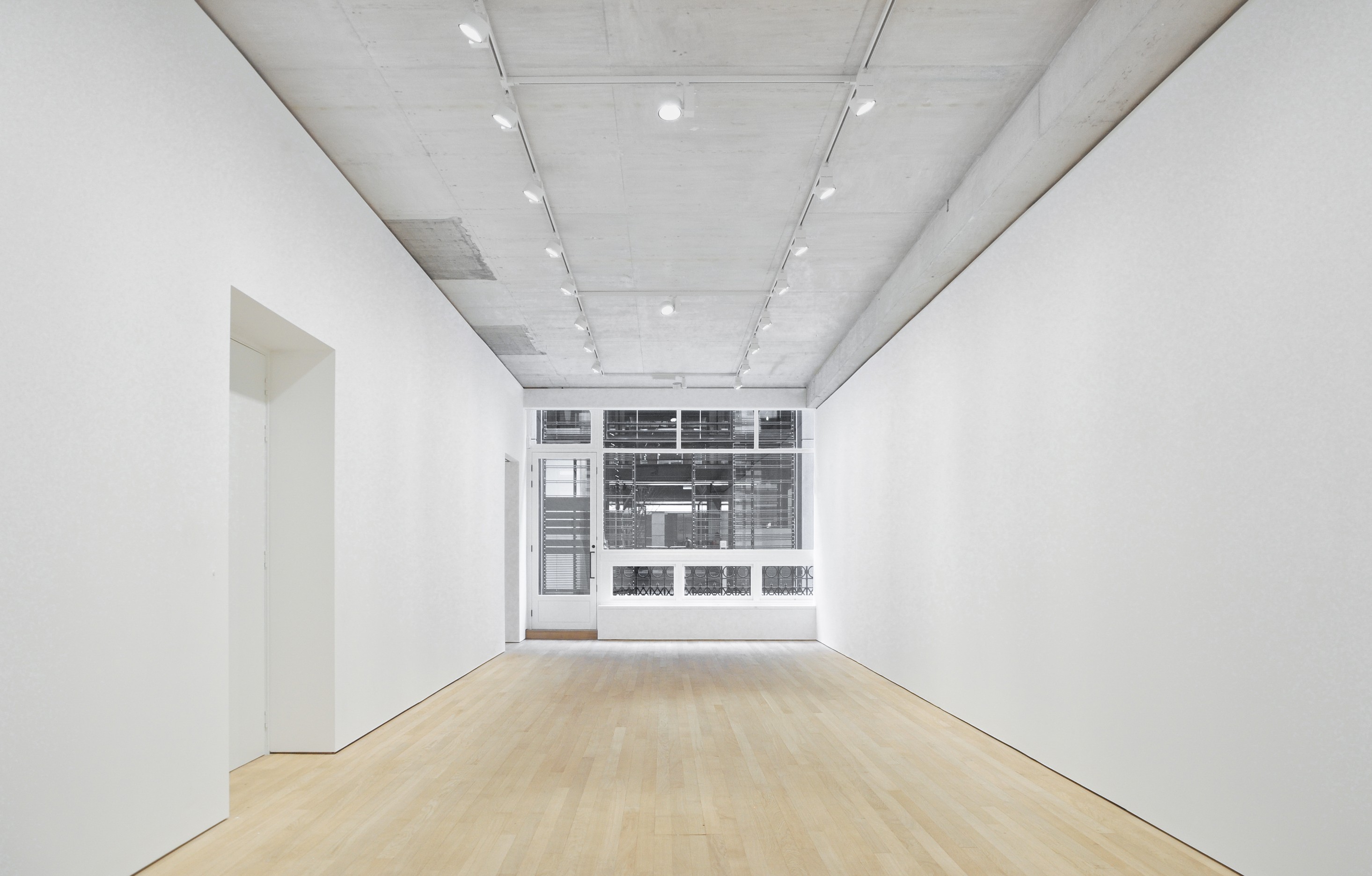 Minimalist event space with natural light for meetings and workshops at No.9 Cork Street.