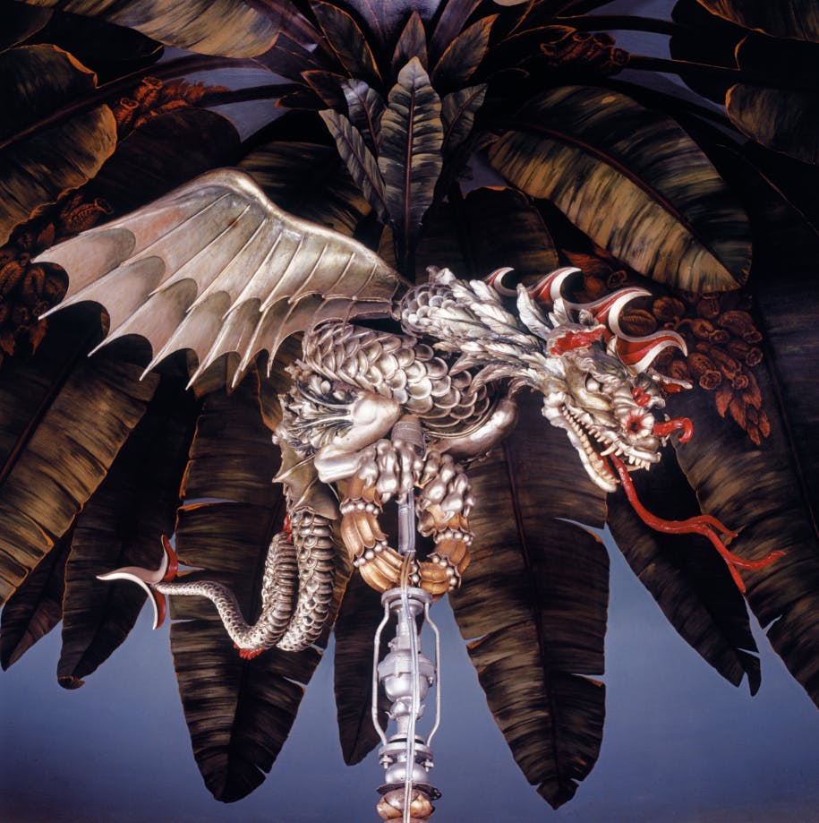 Dragon sculpture in Royal Pavilion's Banqueting Room, ideal for themed events and photos.