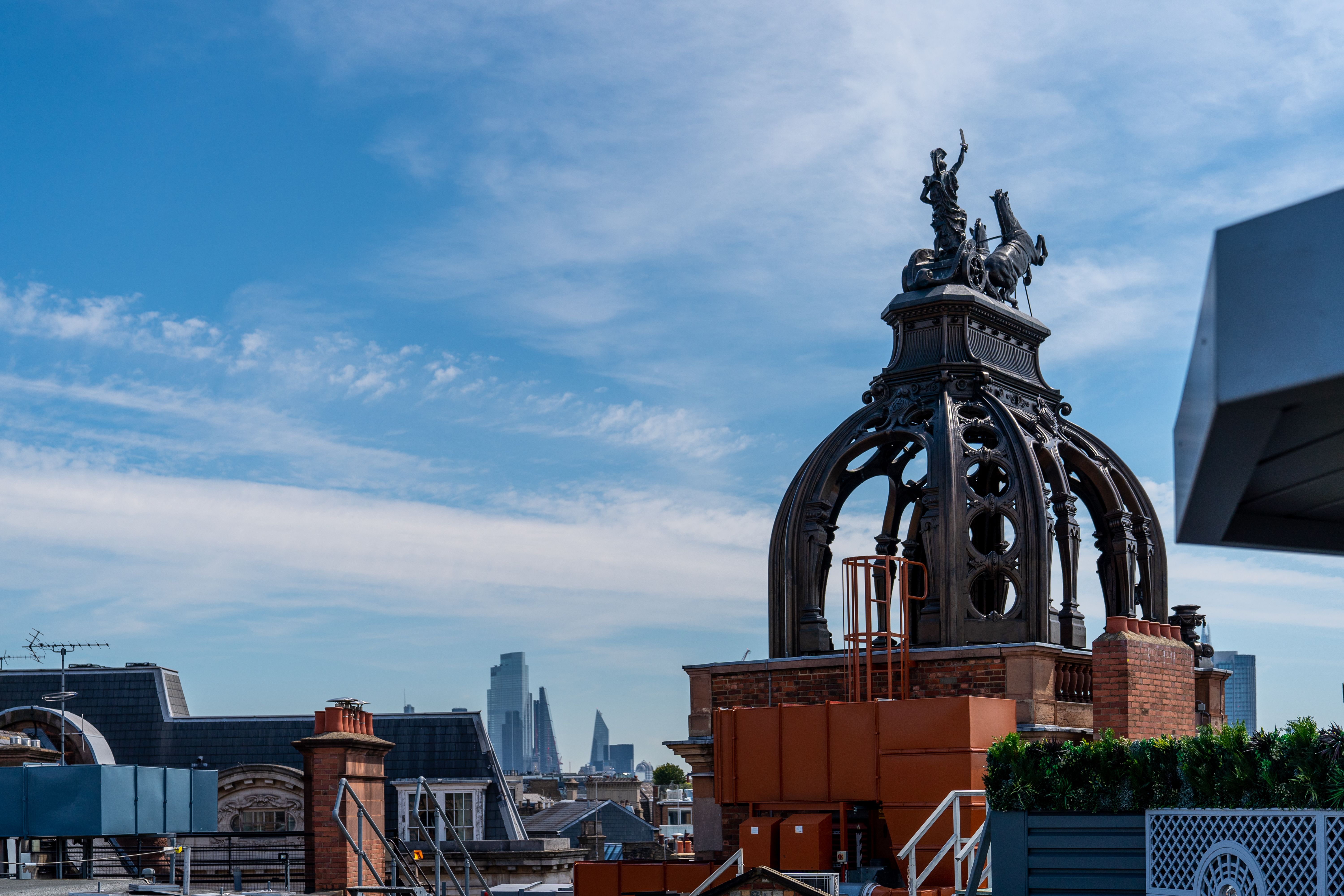 Rooftop Bar at The Hippodrome Casino with ornate dome, perfect for upscale events. - Banner