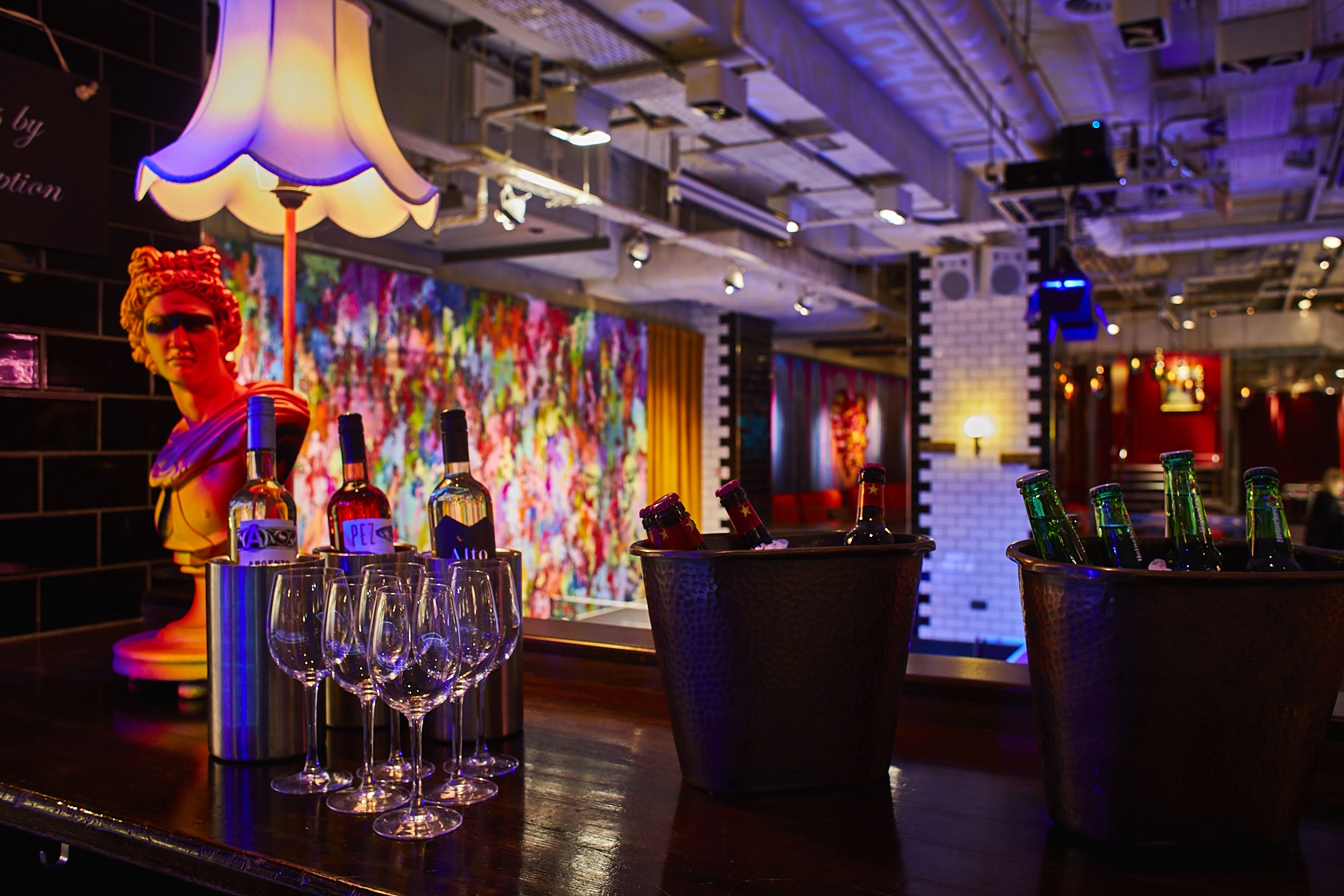 Vibrant event space with stylish bar for networking and celebrations at Bounce Farringdon. - Banner