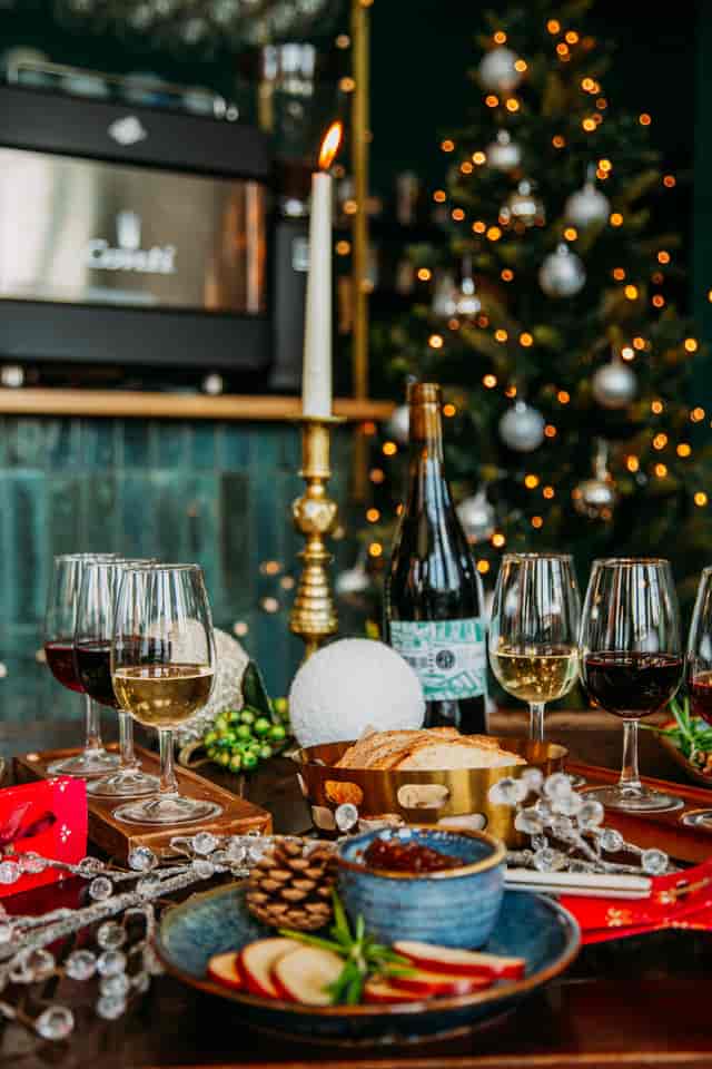 Elegant table setting with wine glasses for festive gatherings and special occasions.