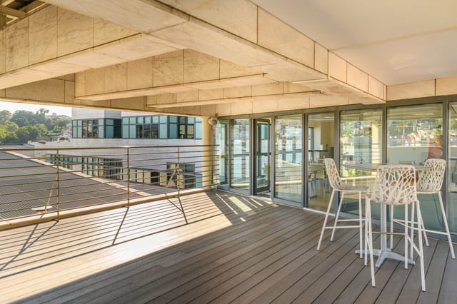 Saramago room at NH Collection Liberdade, modern event space with scenic views.