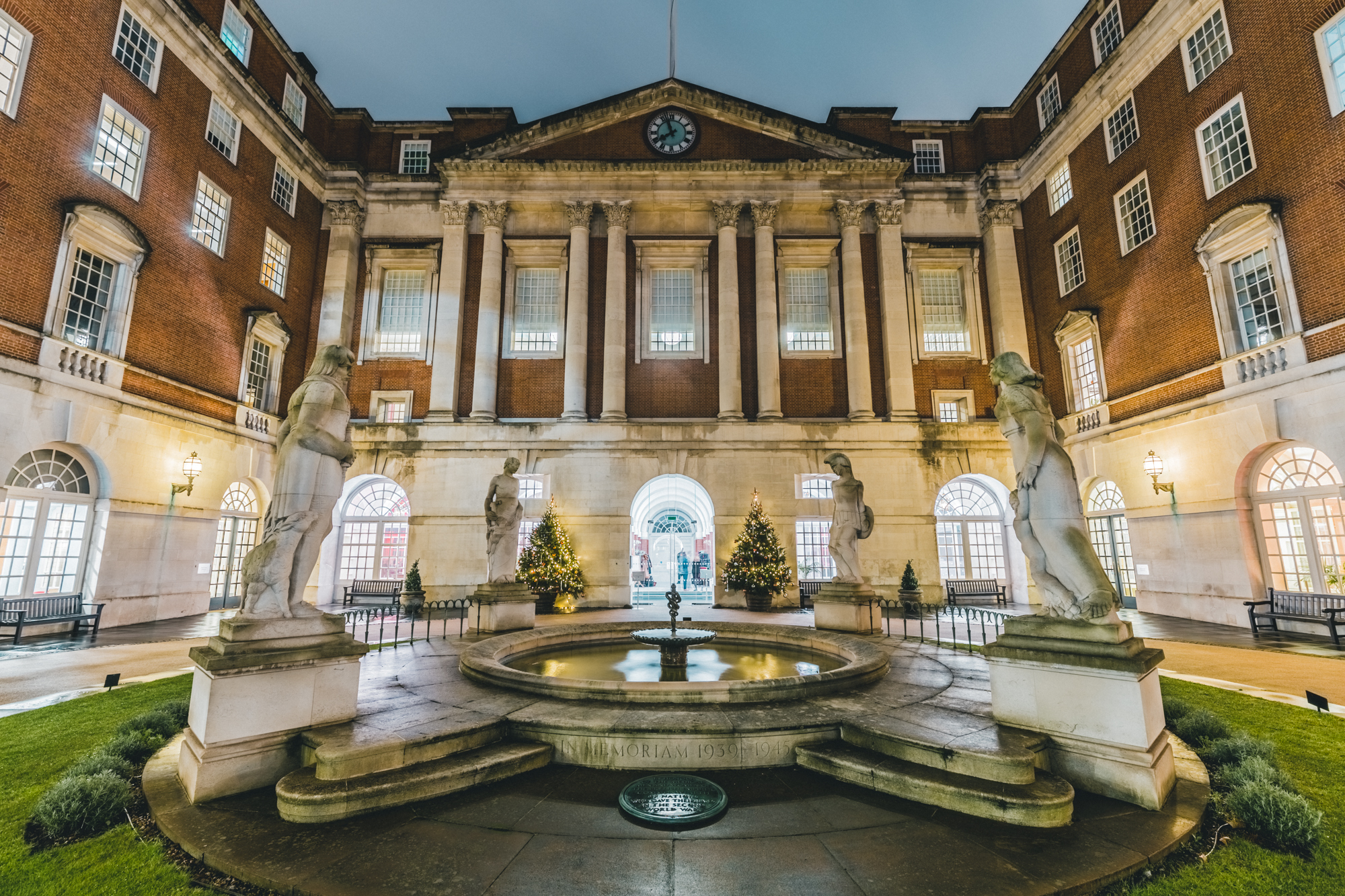 Elegant BMA House venue with central fountain for upscale Christmas parties and events. - Banner