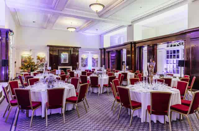 BMA House Christmas party ballroom, elegant red chairs, corporate events