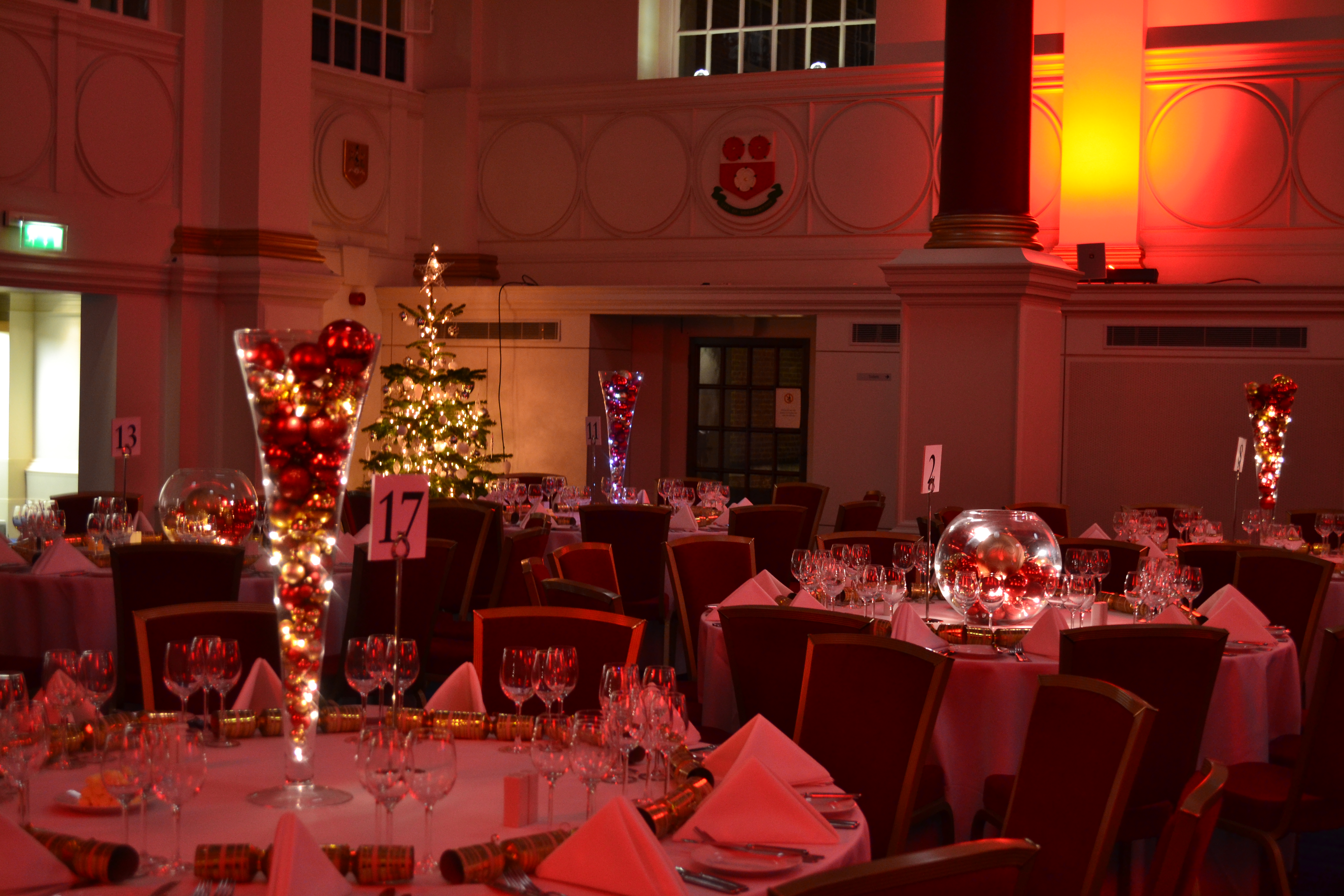 Elegant banquet hall with Christmas tree, perfect for holiday parties and corporate events. - Banner