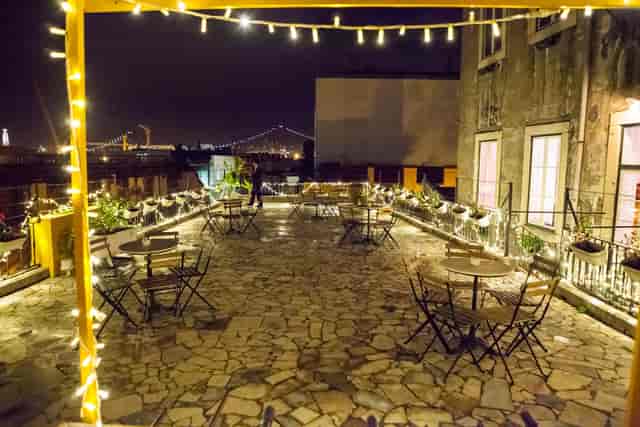 Rooftop venue with string lights, perfect for intimate gatherings and cocktail receptions.