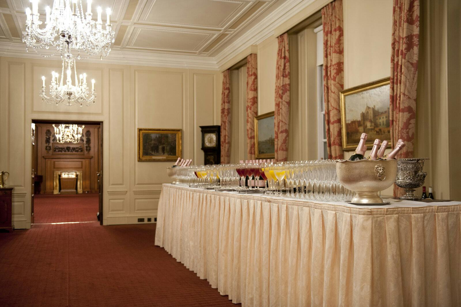 Elegant Luncheon Room with long table, ideal for networking and celebratory events.