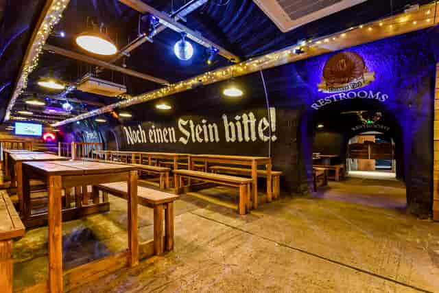 Bermondsey Bierkeller: rustic venue with vibrant art for casual gatherings and events.