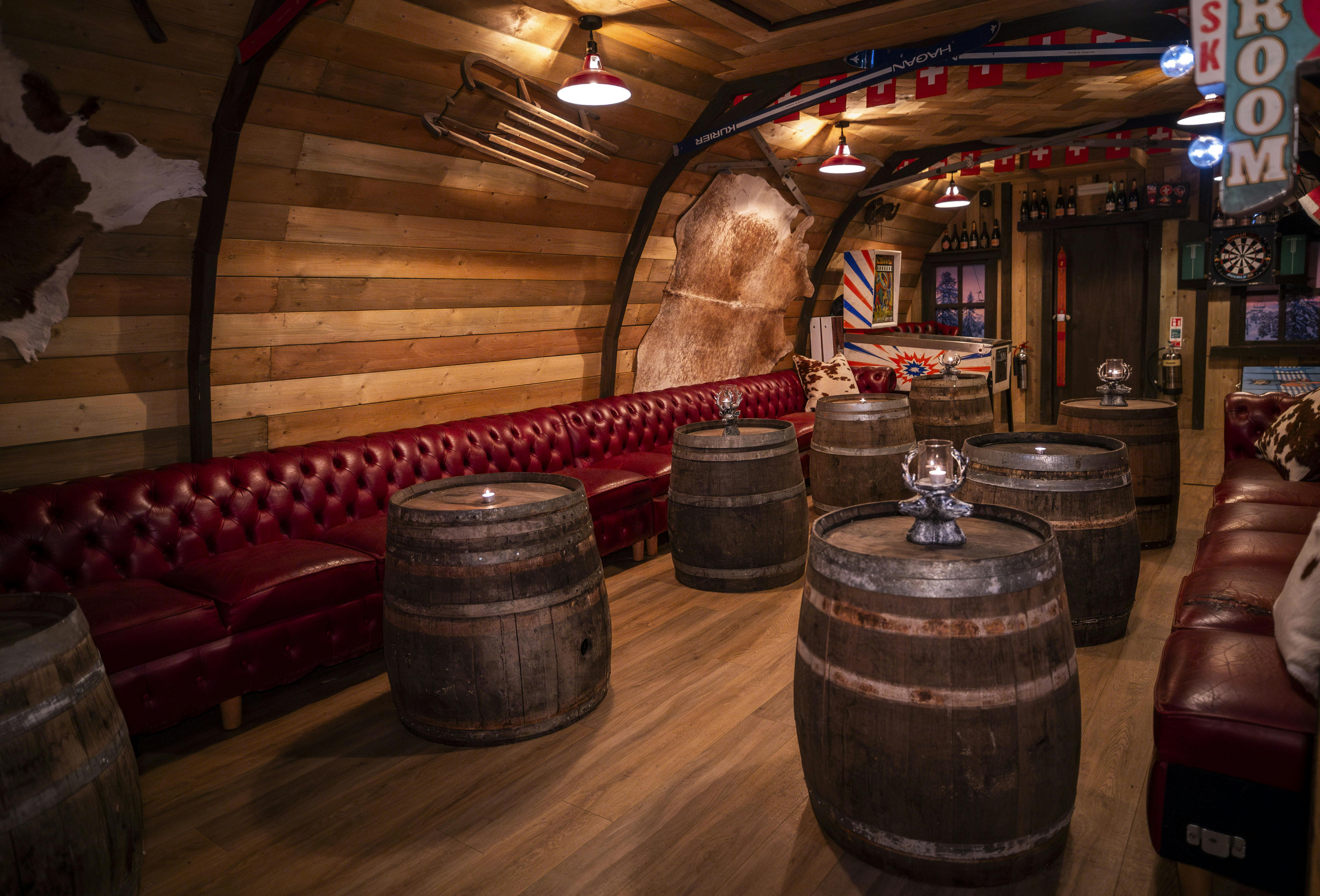 Huski Lodge event space with rustic walls, ideal for networking and gatherings.